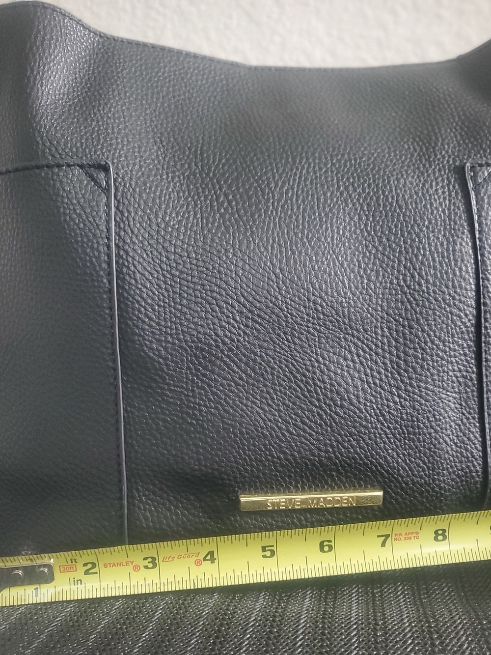 Steve Madden Black Pebbled Leather Crossbody with Gold Logo Plate